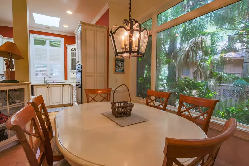 The kitchen table seats 6.