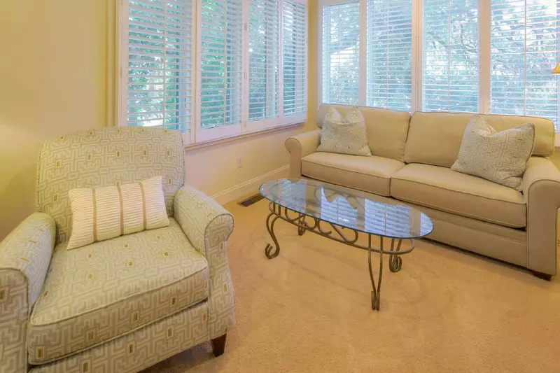This seating area in the master suite is the perfect spot for a quiet cup of coffee.