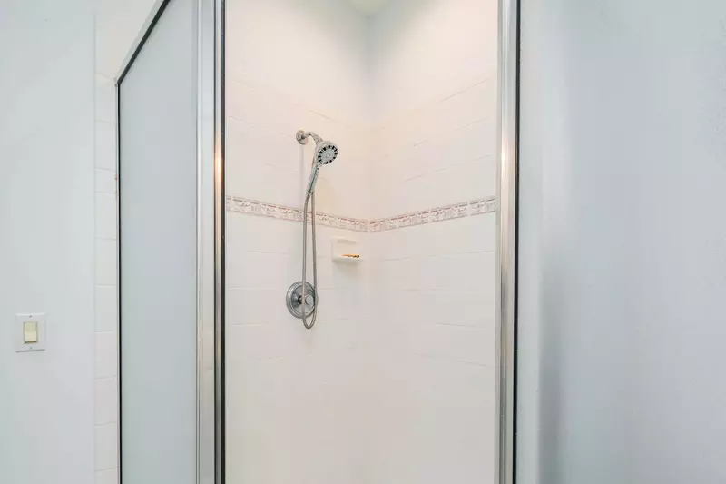 The twin suite bathroom has a walk-in shower.