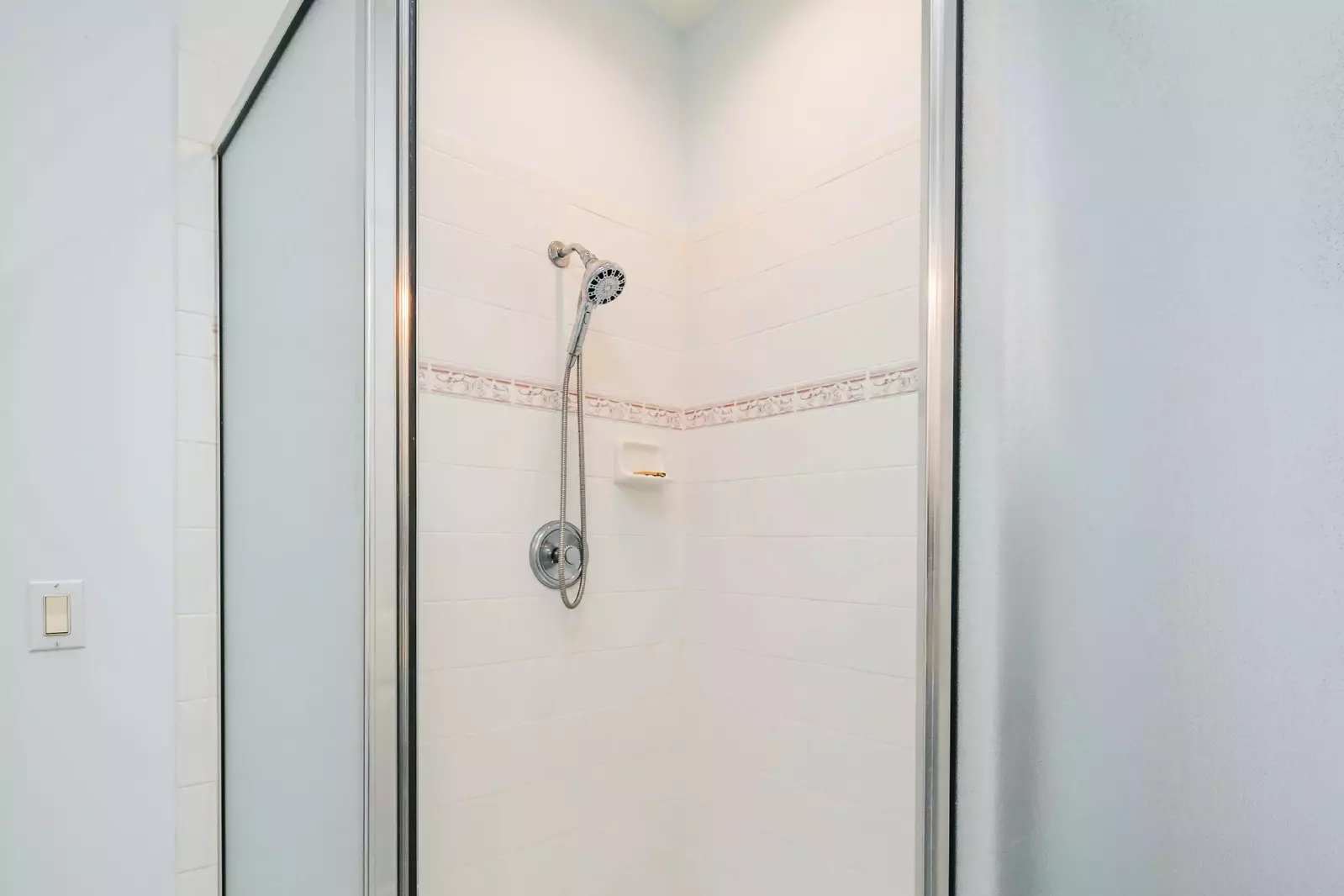 The twin suite bathroom has a walk-in shower.