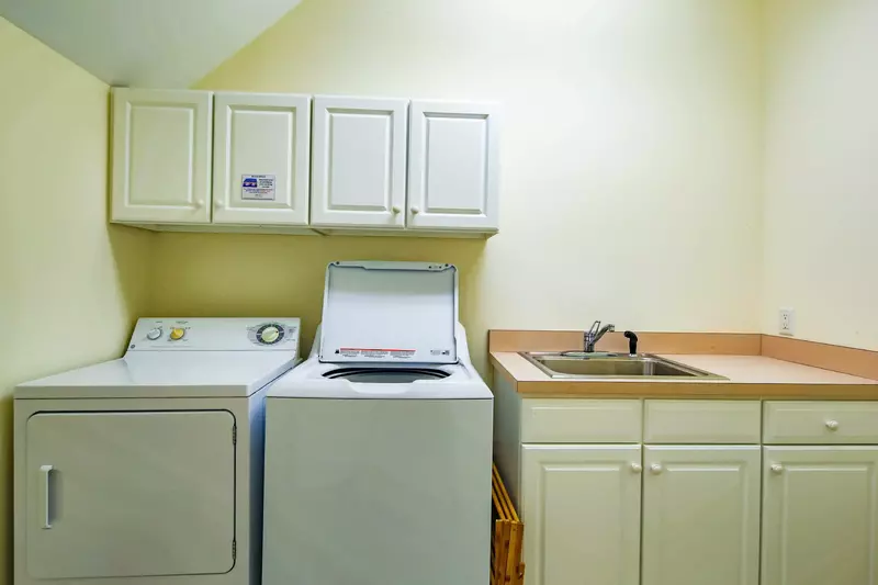 There is a laundry room on the second floor of the home.