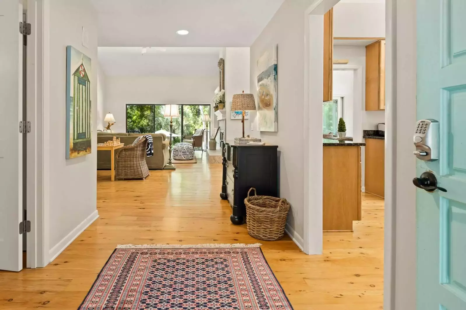 When you enter the front door, you'll find this entryway that connects to the living room, kitchen and bedrooms.