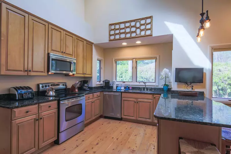 Sailors Cove features a spacious kitchen with vaulted ceilings.