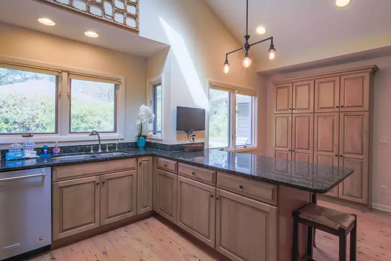 There is plenty of room within the spacious kitchen to prepare your family's meals.