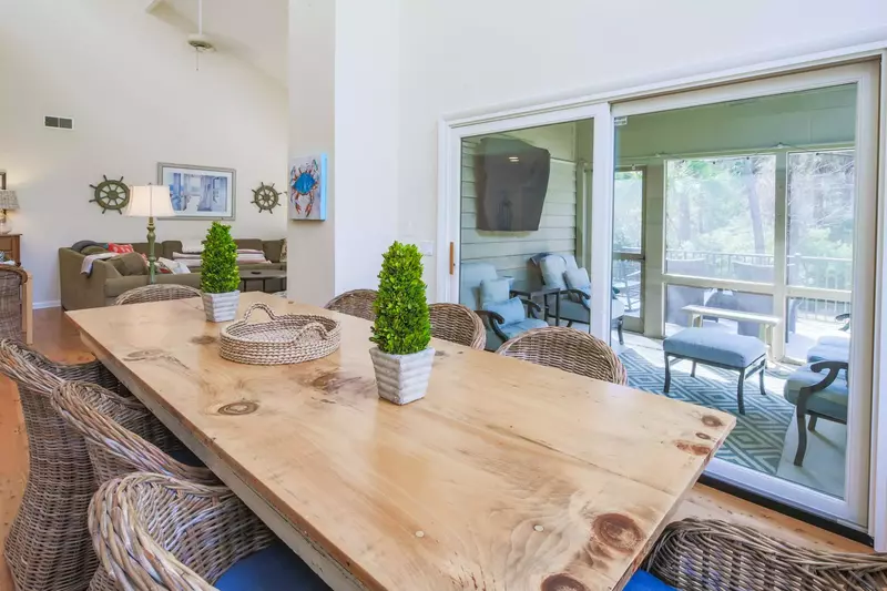 The dining table seats 8.  There is additional seating at the kitchen stools and the outdoor dining table.