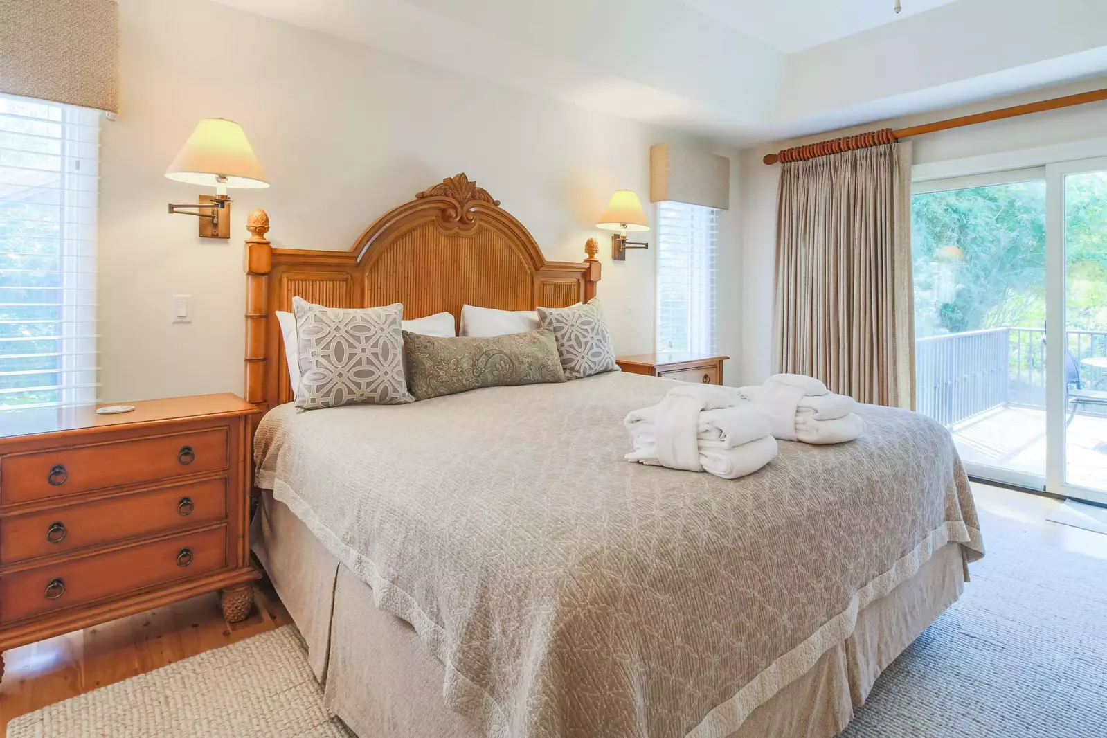 The master suite, which is located on the home's lower level, has sliding door access to the back deck.
