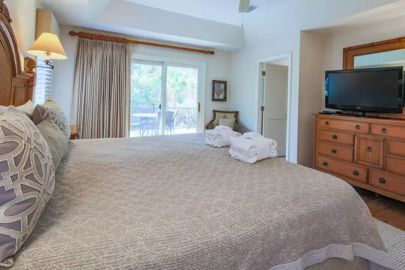 The master suite also has an en suite bathroom through the door in this photo.