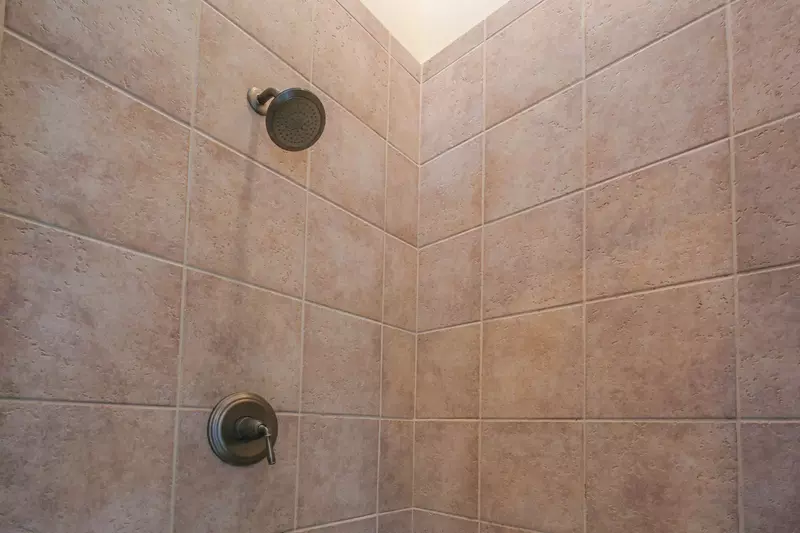 There is also a tiled, walk-in shower in the master bathroom.