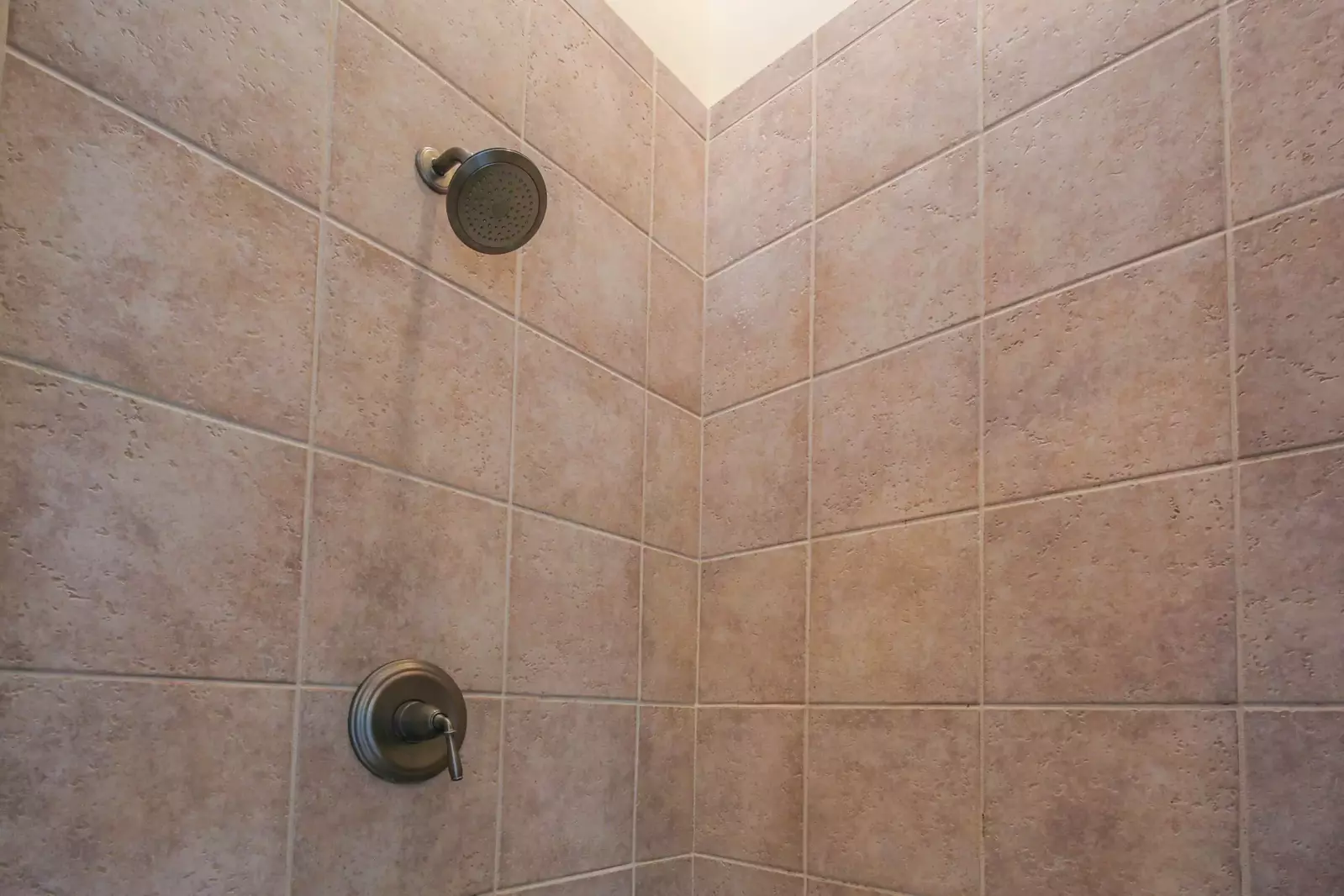 There is also a tiled, walk-in shower in the master bathroom.