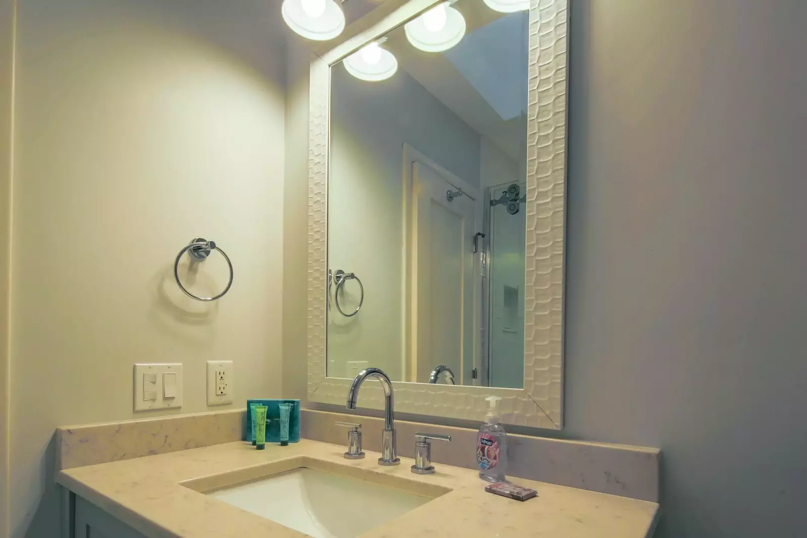 The en suite bathroom for the queen suite features a spacious vanity.