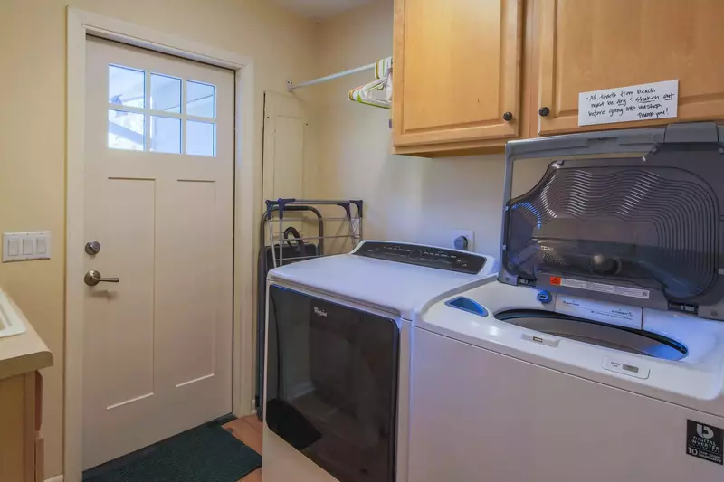 The home has a full-sized washing machine and dryer.