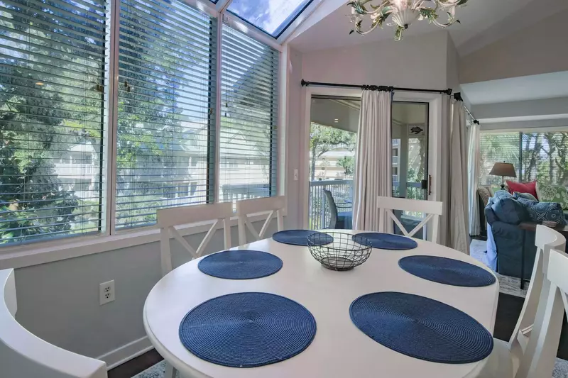 This second floor villa features lagoon views and a covered balcony.