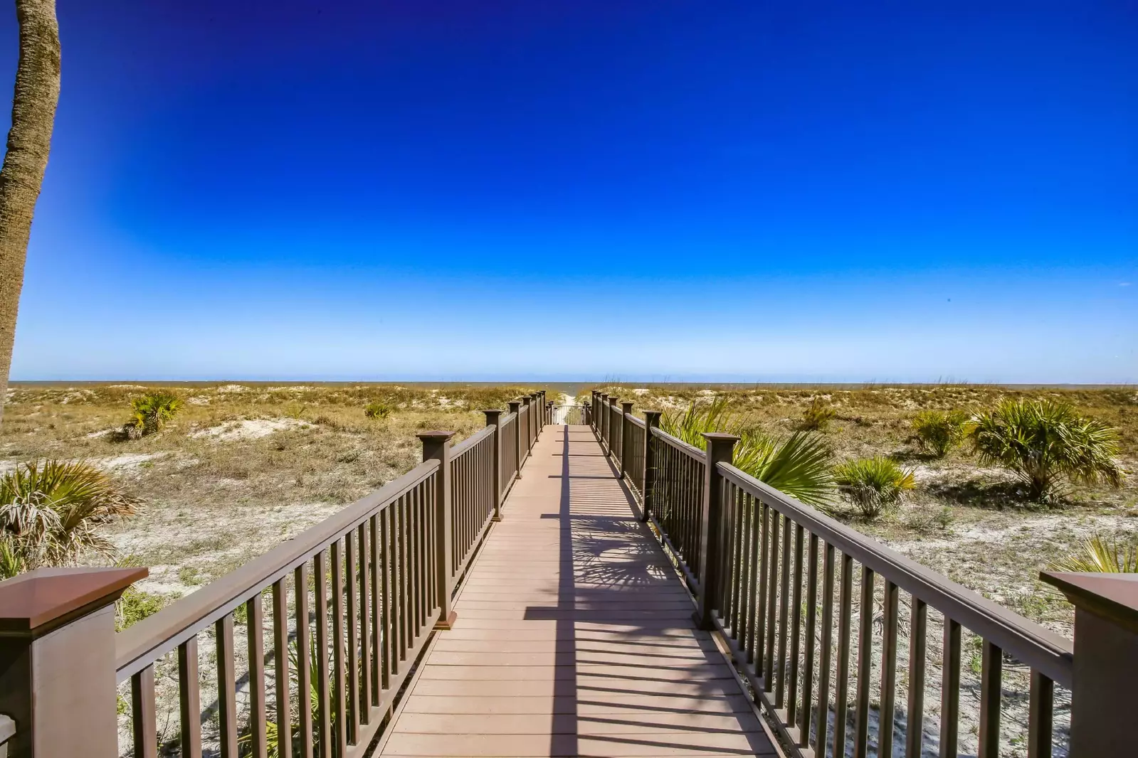 The walk to the beach is easy breezy via this community boardwalk & beach access point.