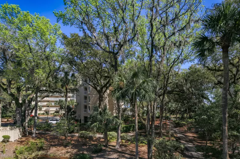 Follow this wooded pathway to the community pool and beach access point.