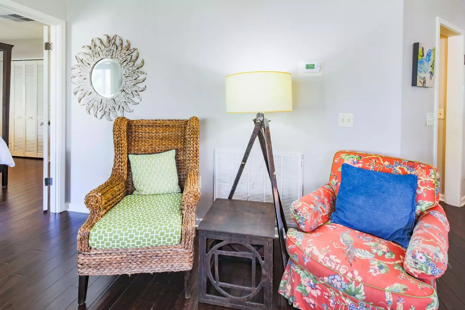 This seating area divides the doorways to the master suite (on the left) and the queen suite (on the right).
