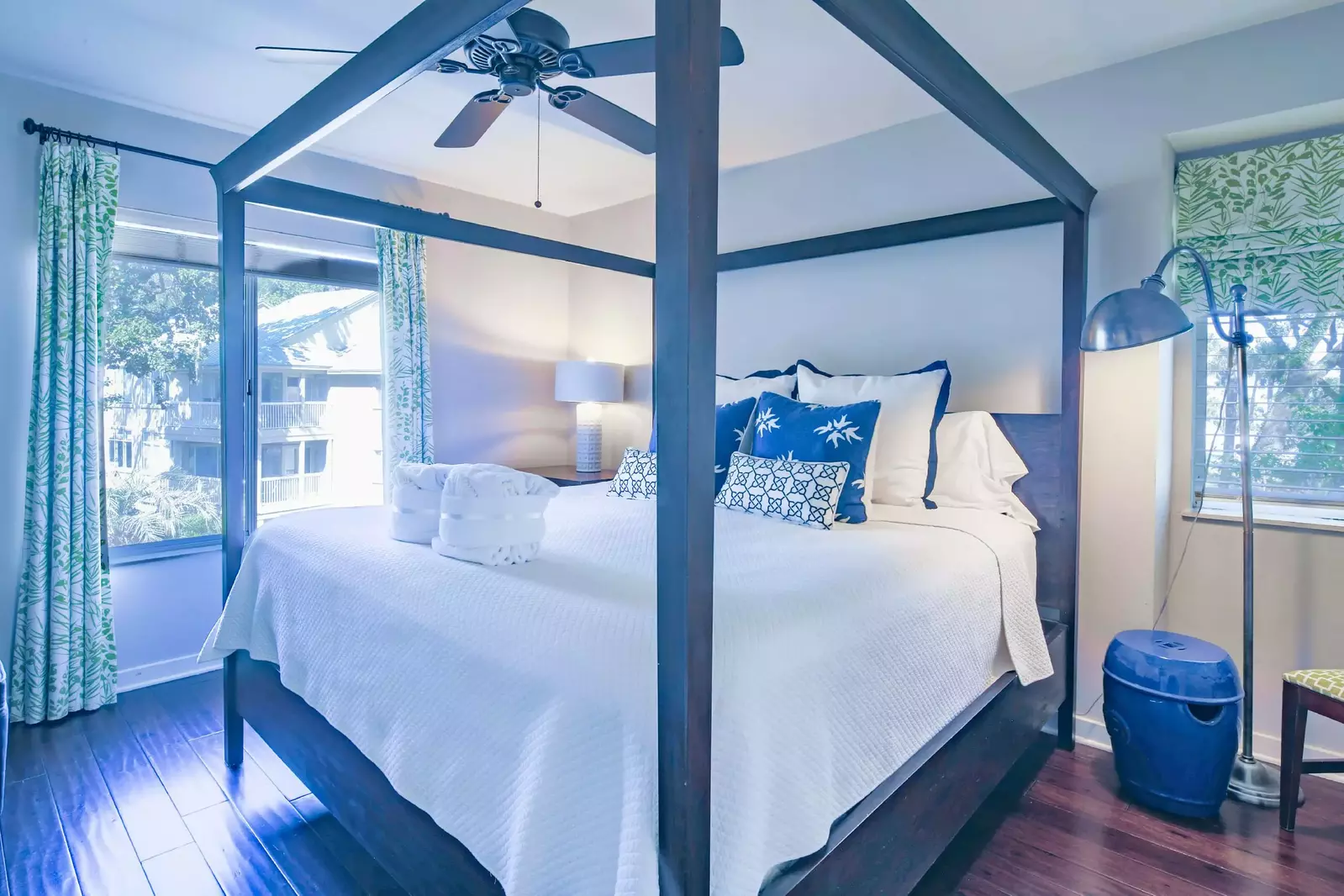The master suite features a king bed and lagoon views.