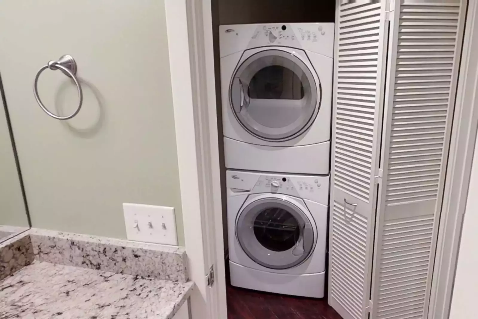 Laundry has stackable Washer/Dryer - Front Loading - High Efficiency