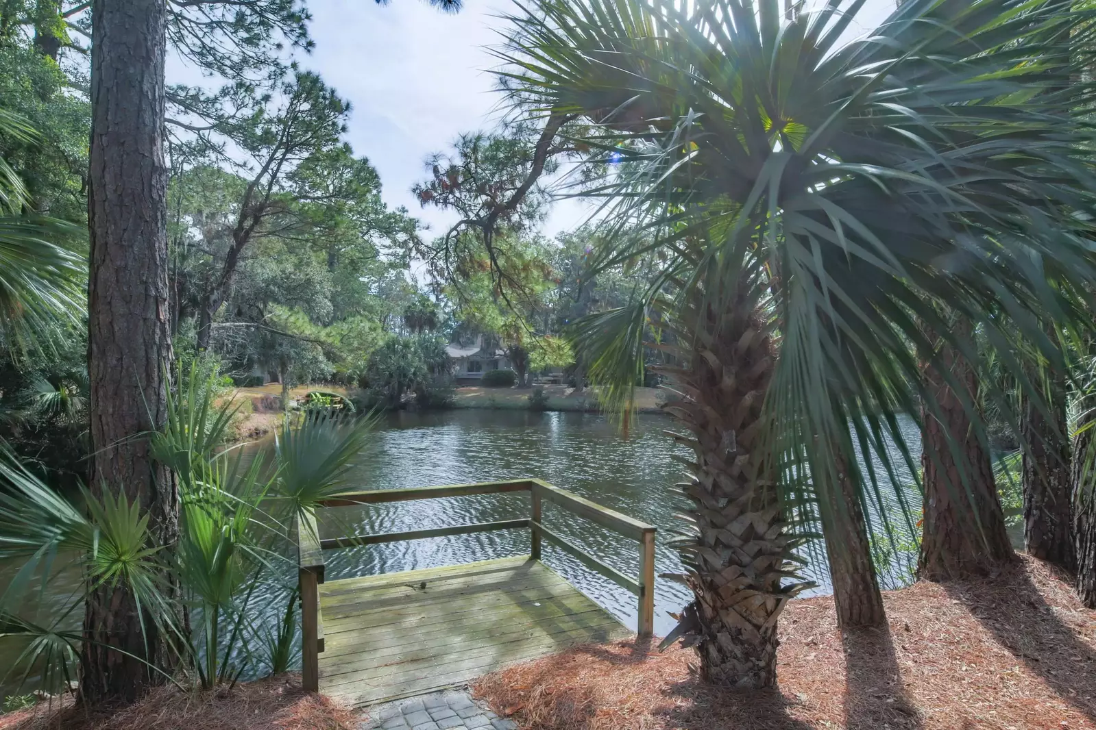Follow the sidewalk off of the pool area to find this deck off of Audubon Pond.