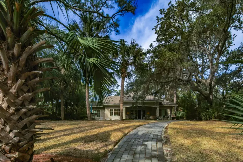 Follow this paved sidewalk back to the house from the Audubon Pond.