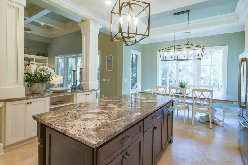 The kitchen opens onto both the dining area and the living room.