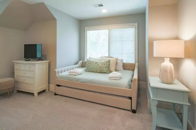 There is a second bed with a full mattress and a twin trundle bed below.