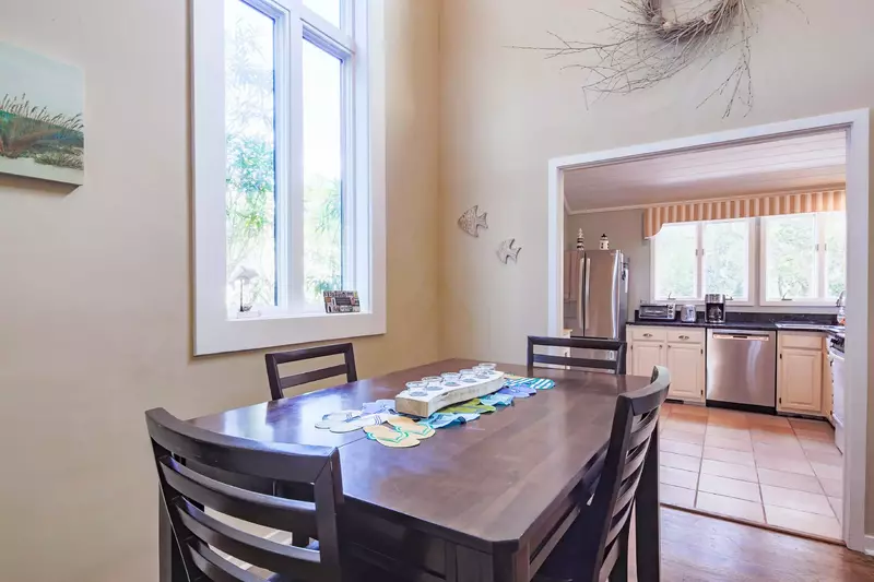 The dining table comfortably seats 4.