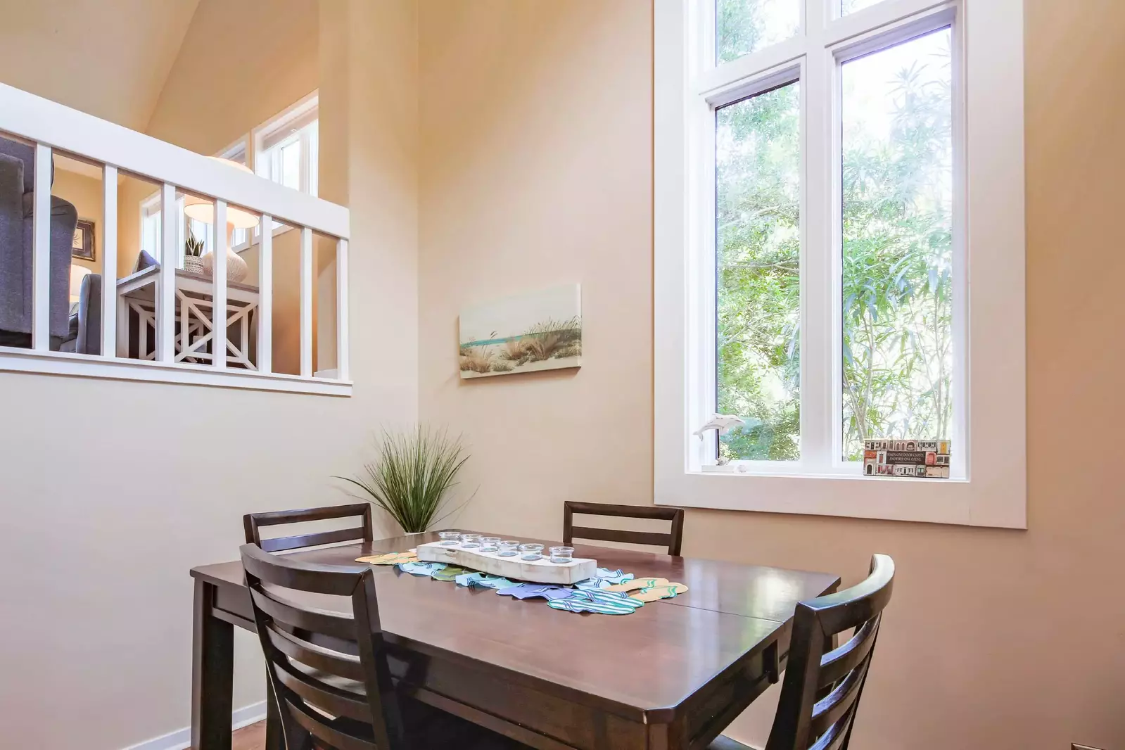 There is a half flight of stairs that connects the dining room level to the upper living room level.