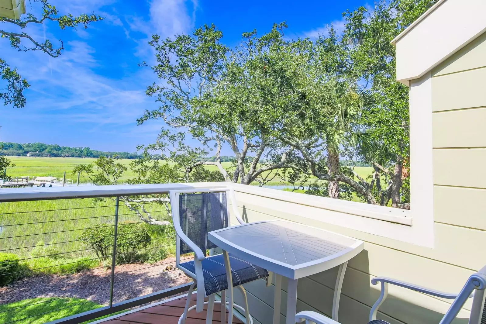 The back deck features a small dining table that seats two.