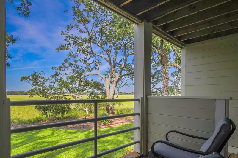 The covered deck looks out onto the spellbinding marsh.