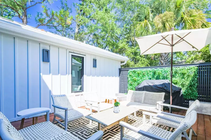 Bask in the glorious Lowcountry sunshine on the private side deck.