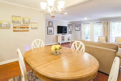 Gather together for meals at the home's dining table.
