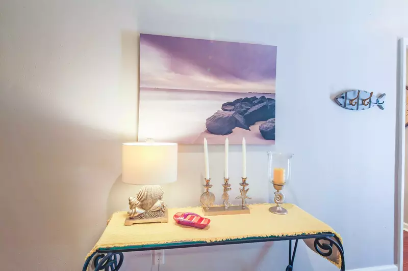 When you enter the front door, you'll find an entryway that connects to the living room and kitchen.