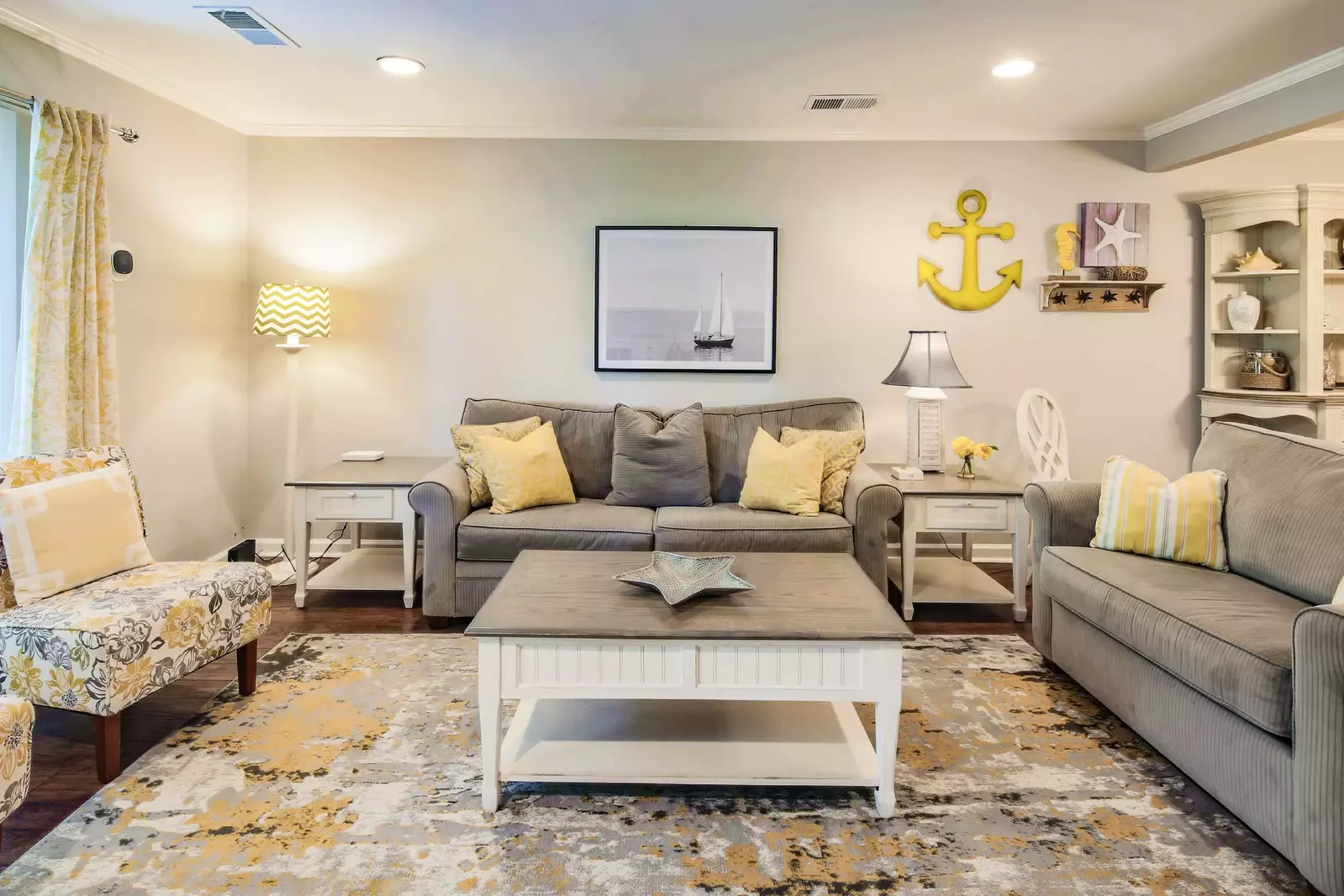 The living room features a spacious seating area.