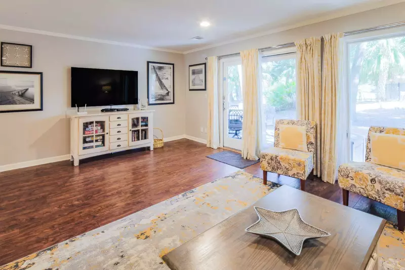 Step out the sliding glass door in the living room to access the back deck.