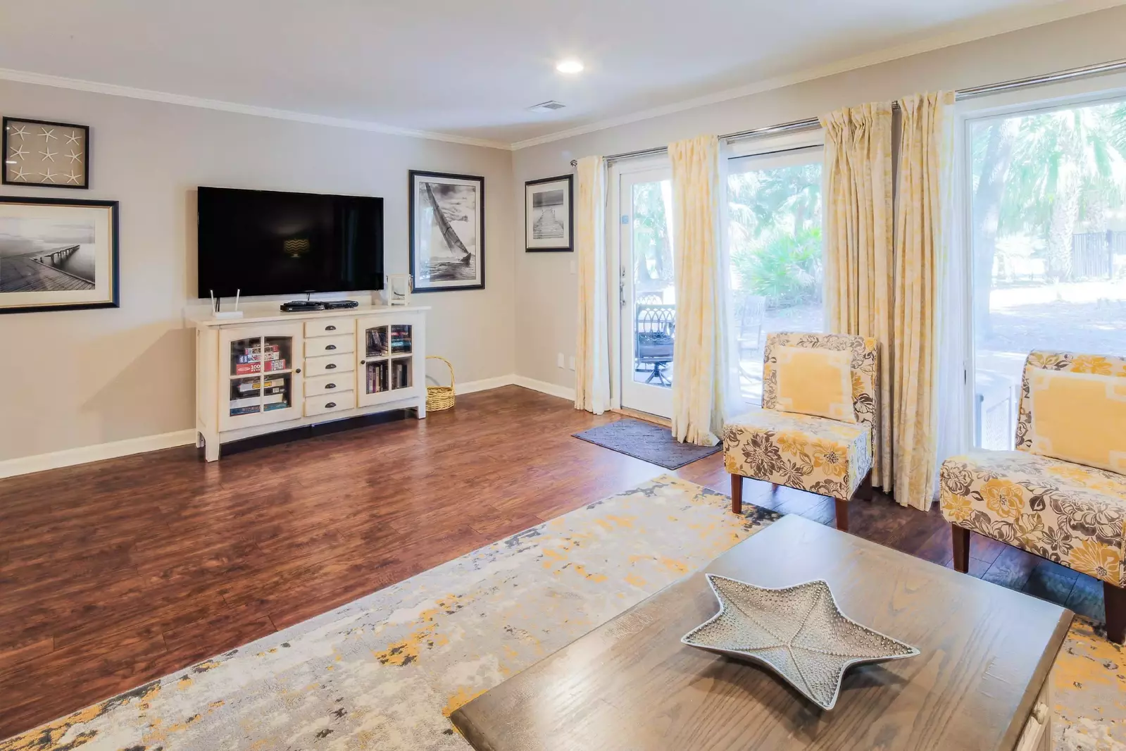 Step out the sliding glass door in the living room to access the back deck.