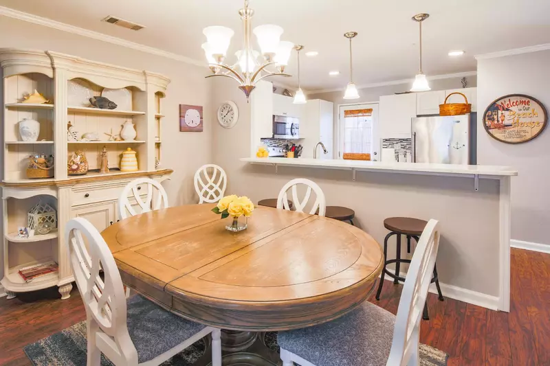The dining table seats 6.  There is also an outdoor dining table on the back deck.
