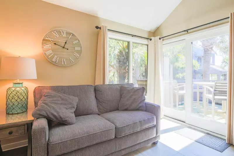 The sliding glass doors in the living room lead to the private back deck.