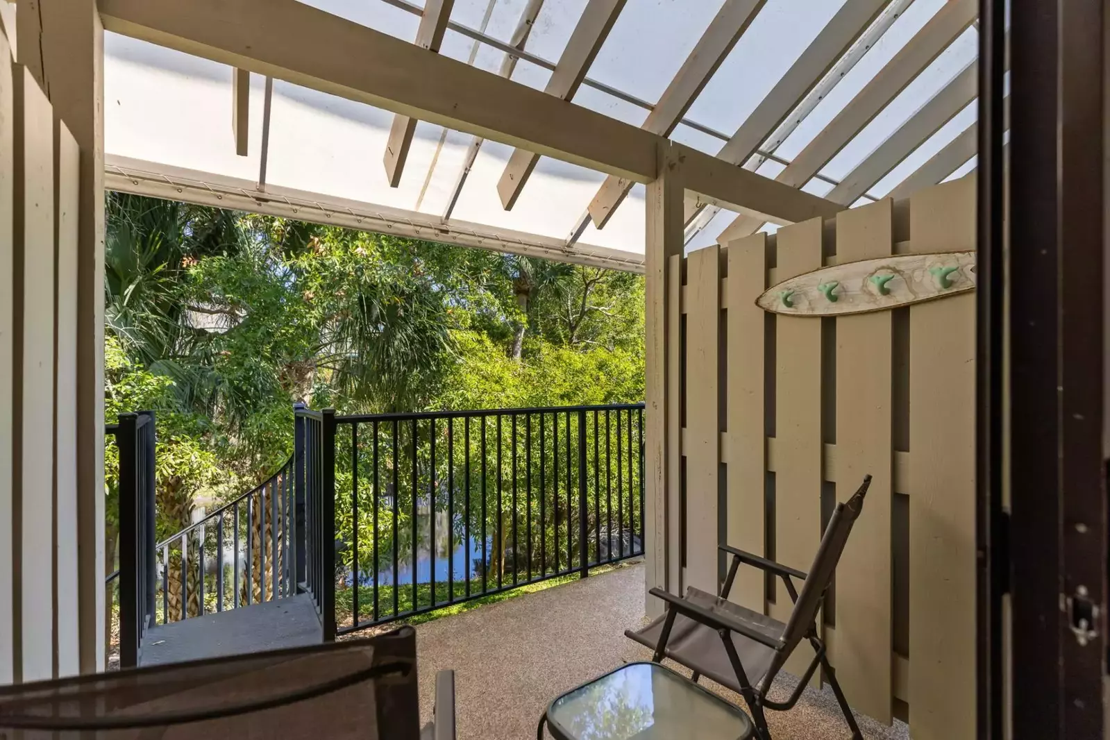 Balcony with spiral staircase leading to ground level
