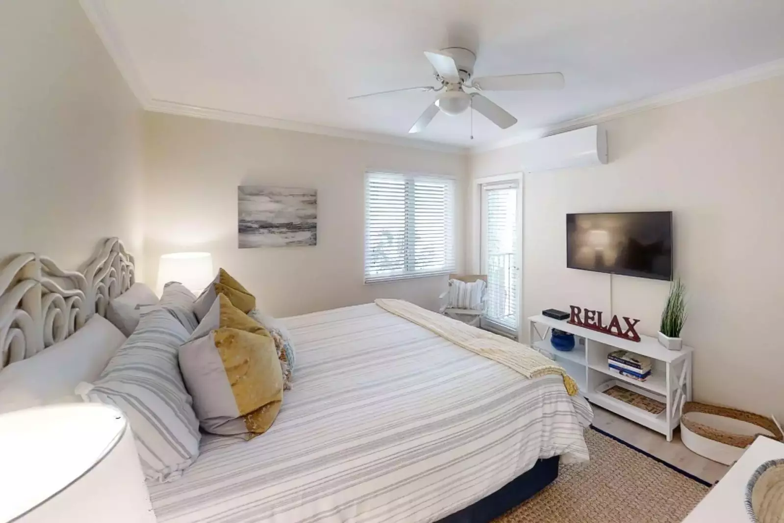 Primary bedroom with walkout to balcony