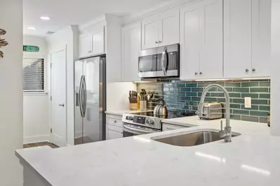 Stone counter tops and beautiful tile work