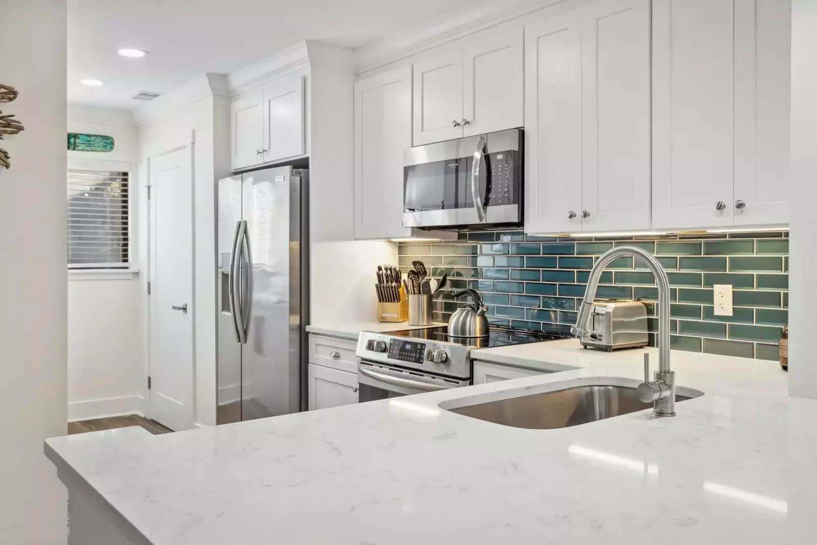 Stone counter tops and beautiful tile work