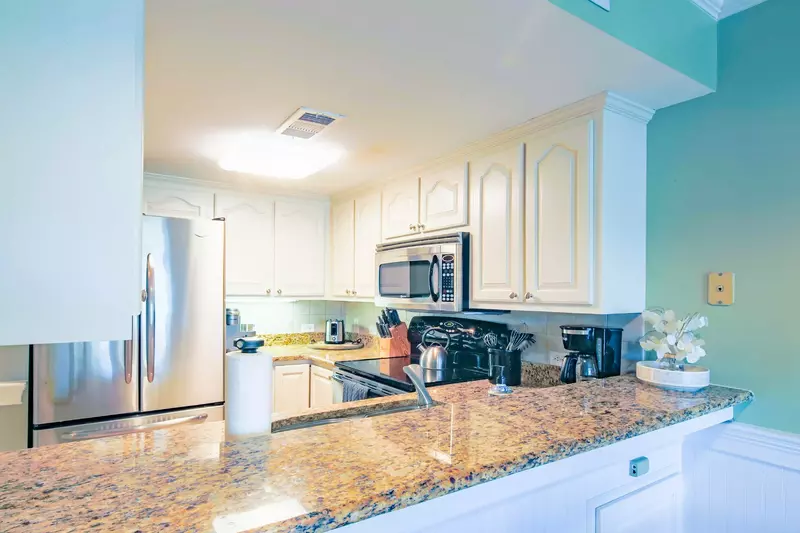 There's plenty of room in the kitchen for you to prepare meals for your family.