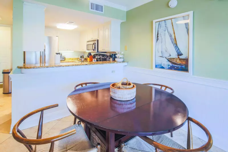 The dining table seats 4. There's an additional dining table on the screened porch that seats 6.