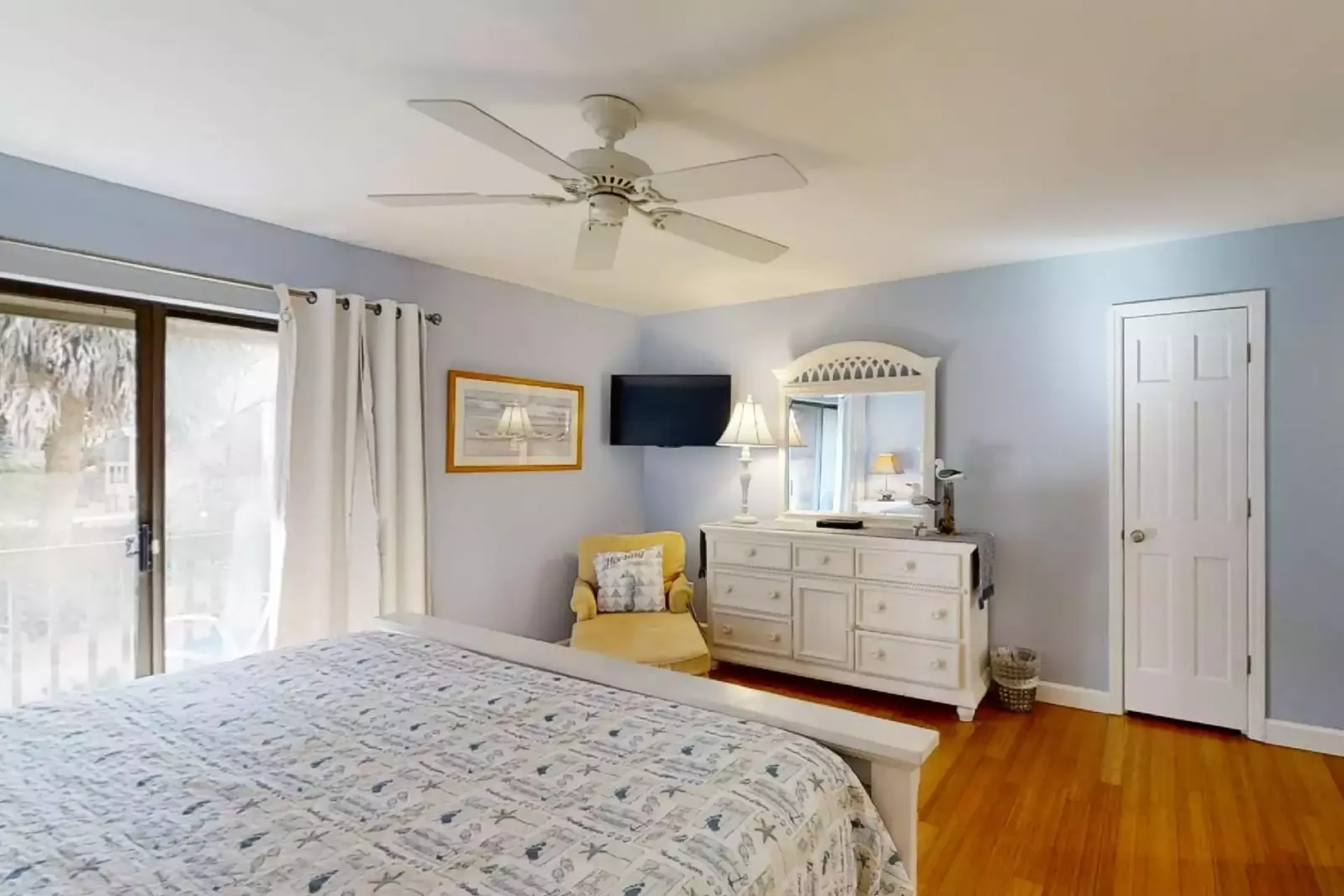 Master suite with sliding doors out to private second level balcony