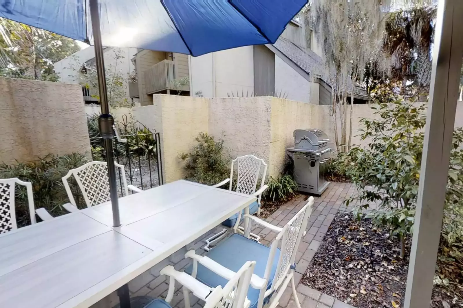 The private patio offers a lovely setting for dining al fresco