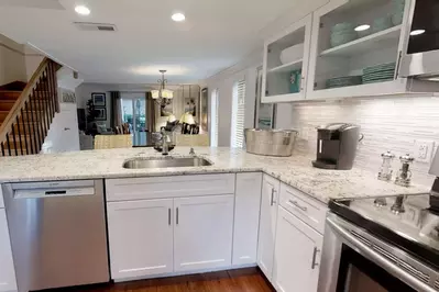 Beautiful granite counters, tile and flooring