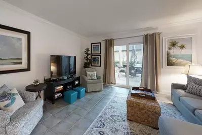 The living area with doors that lead you to your private patio