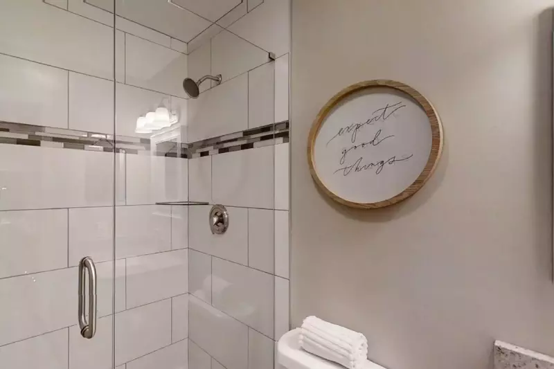 Guest bath with lovely tiled walk-in shower