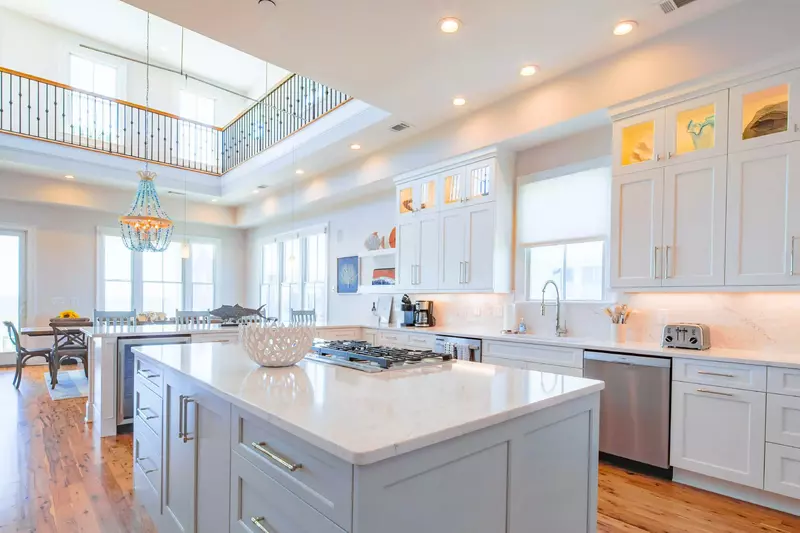 You'll swoon over the hardwood floors and high ceilings in the newly renovated kitchen.