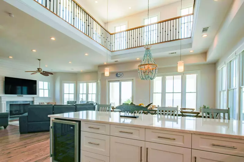 The open floor plan makes it easy to interact with your guests in the kitchen, dining area and living room.